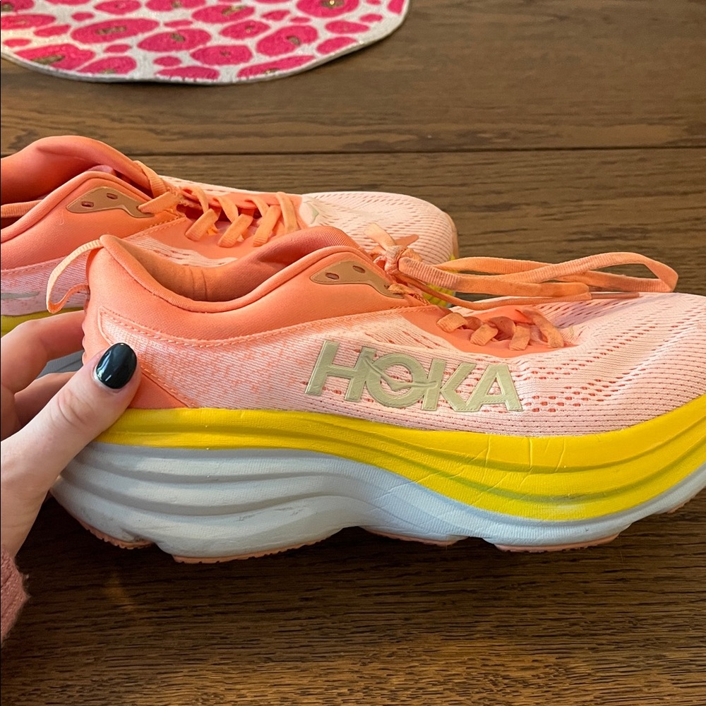 Hoka Coral and Yellow Athletic Shoes